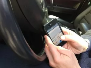 texting-hand-held-phone