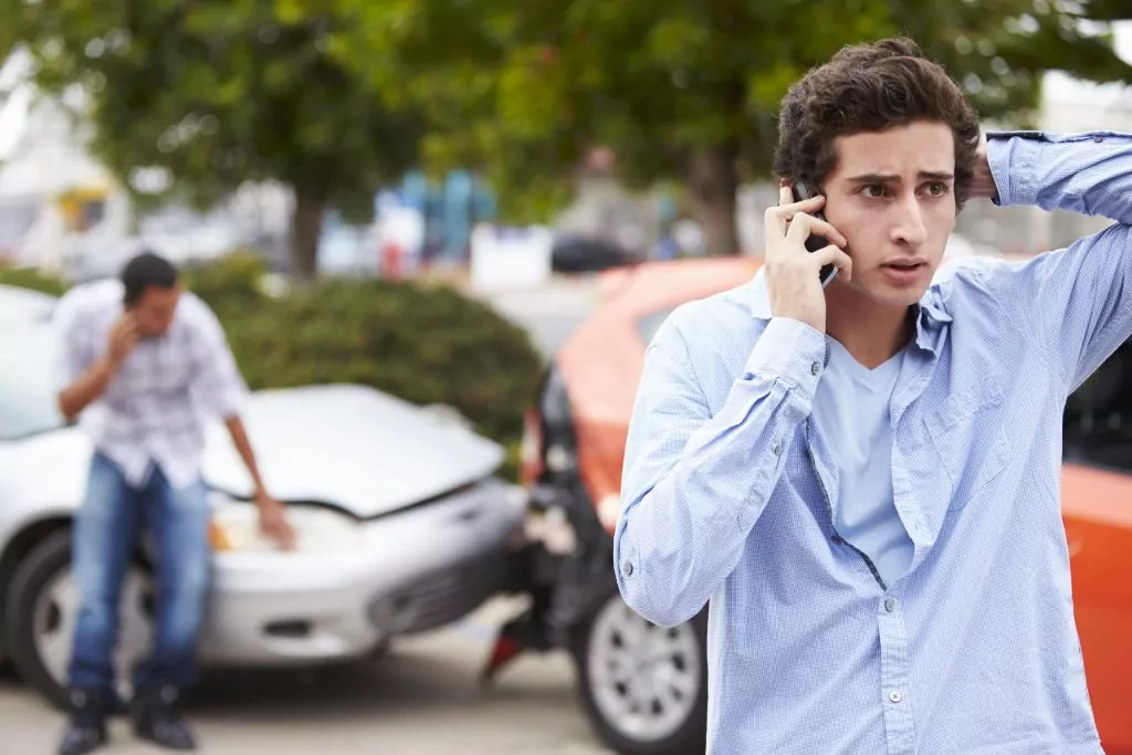 stressed person in car accident that is not their car